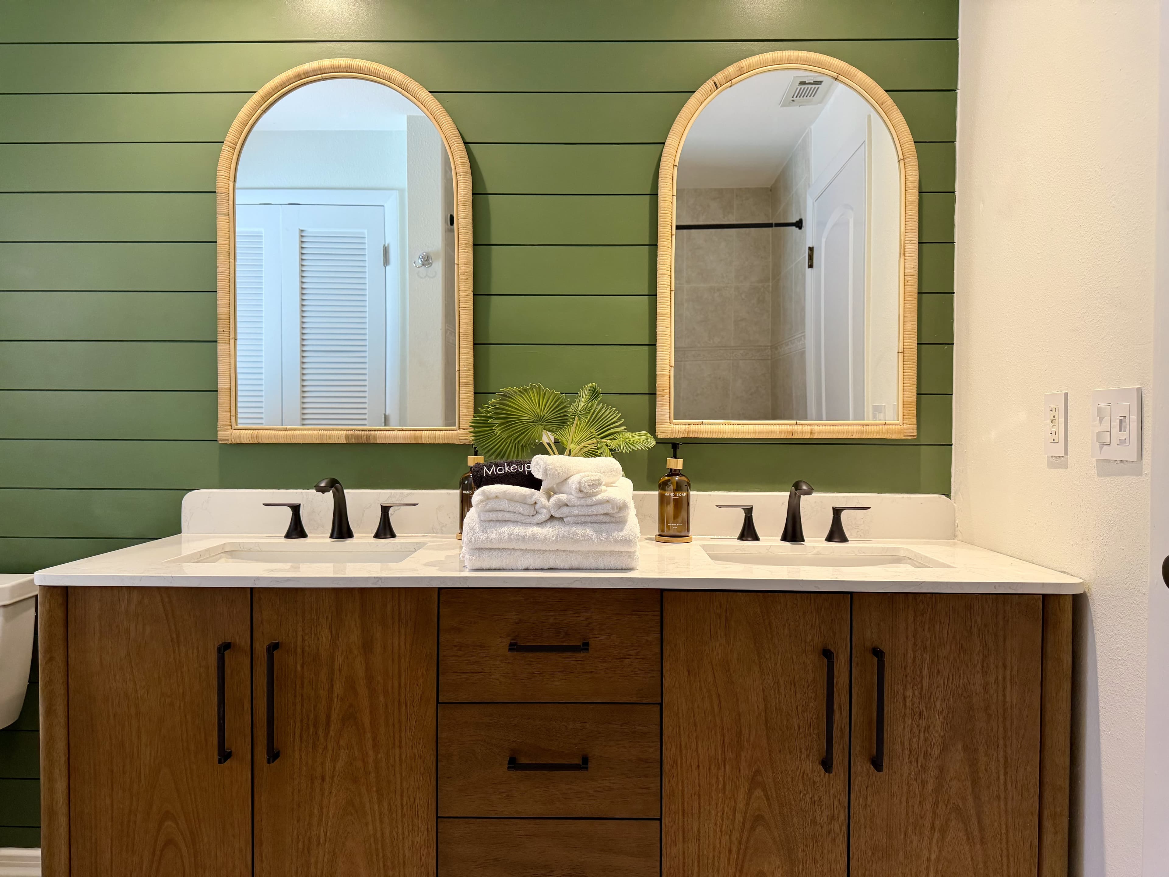 green shiplap double vanity bathroom